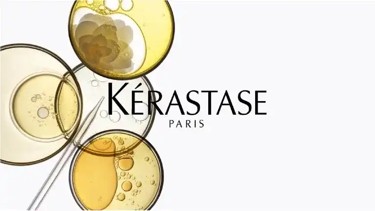 Kérastase Paris logo with layered circles and bubbles, highlighting a cosmetic theme.