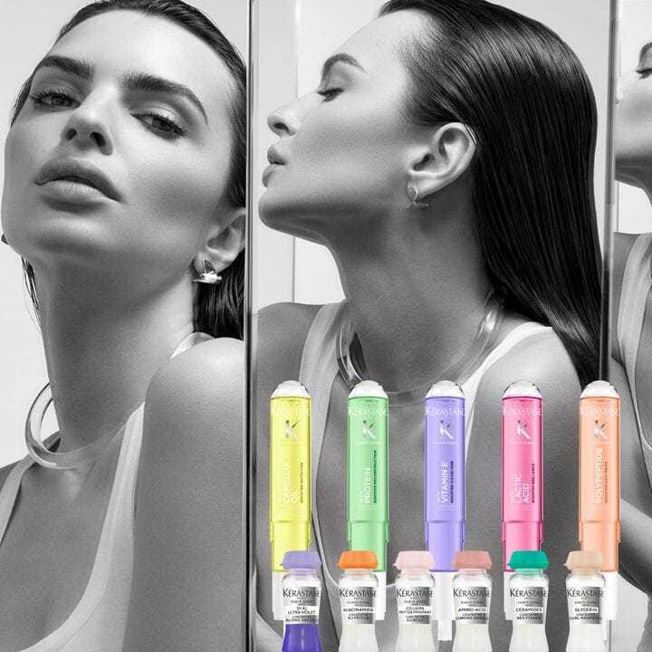 Model with wet hair and colorful Kerastase hair care products displayed below.